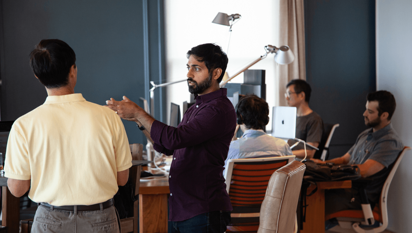 employees working in a shared office space